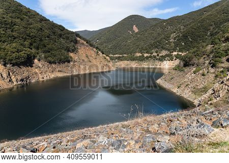 Landscape Of A Lake, Reservoir, In Catalonia, Spain, In Summer. Sunny Day And Green Plants. Vallforn