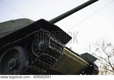 Monument With The Soviet T-34 Tank In Memory Of The Soldiers Of The Great Patriotic War. Monument To