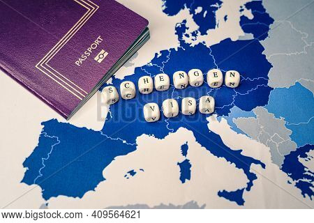 Passport Over A Map Of The Of The 26 Countries That Compose The Schengen Zone