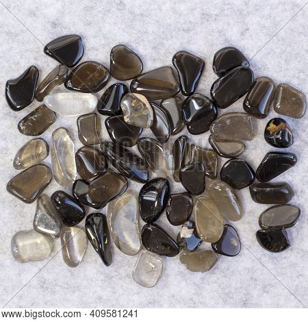 Macro Shooting Of Collection Natural Rock Set Of Morion, Smoky Quartz Gem Mineral Stones On Light Gr