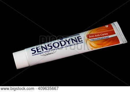 Sensodyne Toothpaste Tube On Black Background. Bucharest, Romania, 2021