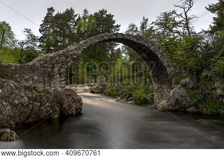 The Old Packhorse Bridge In Carrbridge In The Cairngorms National Park Is The Oldest Stone Bridge Ac