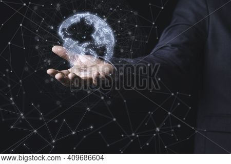 Businessman Holding Virtual World With Connection Line For Global Networks And Technology Linkage Co