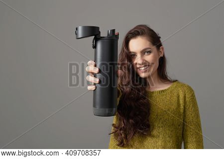 Woman Holding Eco Reusable Smart Thermo Water Bottle With Drink Reminder, Healthy Lifestyle Concept