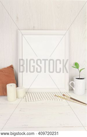 Empty White Frame Mockup With Small Branch Of Succulent Zamioculcas In A Vintage Vase Mug On Old Rus
