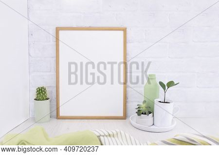 Empty Picture Mockup With Wooden Frame On White Brick Wall Background With Succulents Plants And Gre