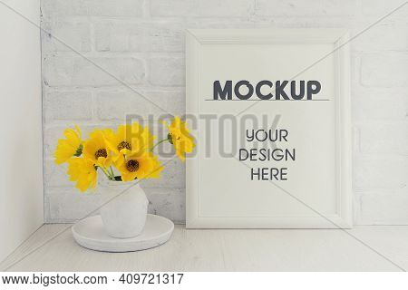 Empty White Frame Mockup With A Bouquet Of Yellow Sunflower Flowers In A Vintage Vase On A Tray In P