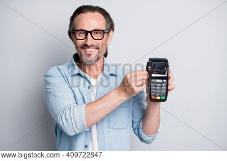 Photo Of Handsome Man Happy Smile Pay Paypass Terminal Shopper Buy Isolated Over Grey Color Backgrou