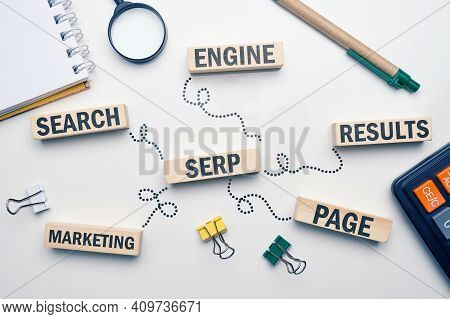 Marketing Buzzword Serp. Term Search Engine Results Page On Wooden Blocks.