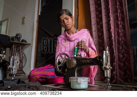 Rajasthan. India. 07-02-2018. Young Woman Is Receiving Sewing Lessons In Their Village, As A Future 