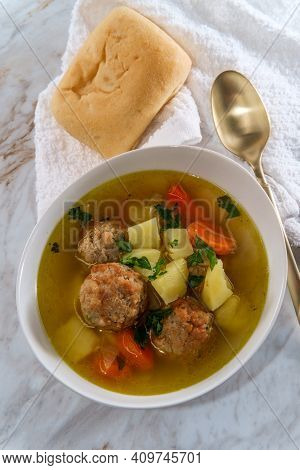 Russian Frikadeller Meatball Soup With Potatoes And Parsley Garnish