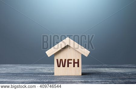 Wooden House Figurine With Abbreviation Wfh (work From Home). New Normal. Strict Requirements And Re