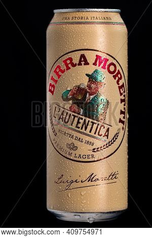 Birra Moretti, A Premium Lager Beer With Water Droplets On Black Background. Studio Photo Shoot In B