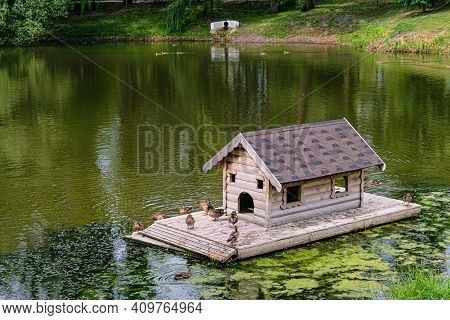 Floating Wooden House For Wild City Birds On The Vezelka River. Belgorod City, Russia - Jule, 2020. 
