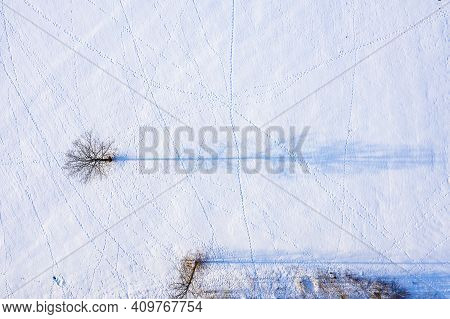 Beautiful Aerial View Of The Huge Frozen Lake In The Middle Of A Forest In Latvia. Frozen Ungurs Lak