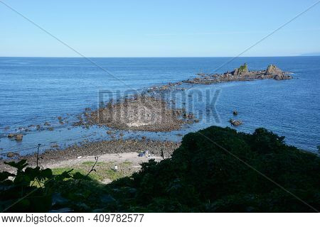 Japan Kanagawa Manazuru Cape. Coast Of Lava Made Of Old Volcanic Eruption.