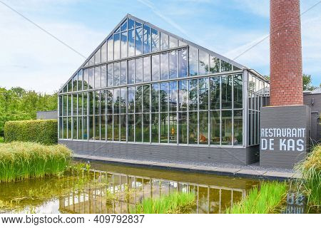 Amsterdam, Netherlands - 10 April, 2020: Restaurant De Kas. Beautiful View Of Luxury Restaurant Buil