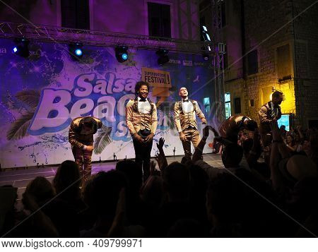 Sibenik, Croatia- July 7, 2017: Grupo Alafia Dance Performances At Salsa Beach Splash Festival In Si