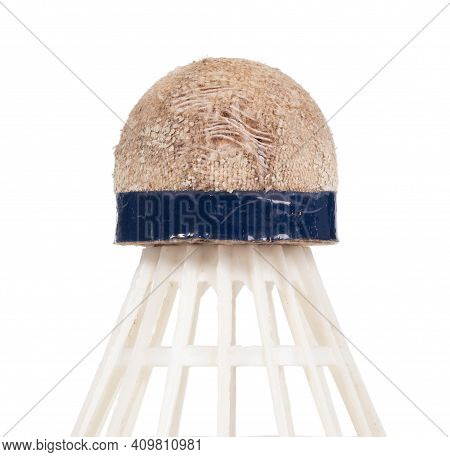 Close-up Of Very Old And Dirty Shuttle Badminton, Isolated On White