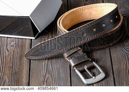 The Belt Is Made Of Cowhide Genuine Leather, Next To A Gift Box. Template For The Design Of Leather 