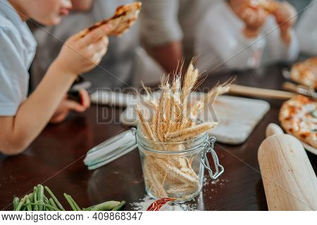 Ogranic And Healthy Food And Vegetables. Rolling Pin With Flour On The Table In Modern Kitchen In Da