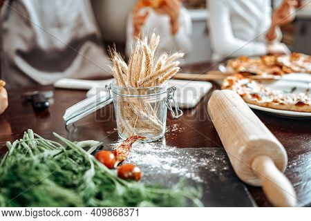 Ogranic And Healthy Food And Vegetables. Rolling Pin With Flour On The Table In Modern Kitchen In Da