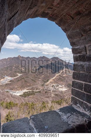 Beijing, China - April 28, 2010: Great Wall Of China. Looking Through Watchtower Opening In Stone Wa