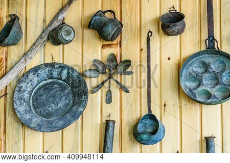 Ancient Kitchen Utensil Hanging On Wall. Kitchenware Of Yoruk Tribe