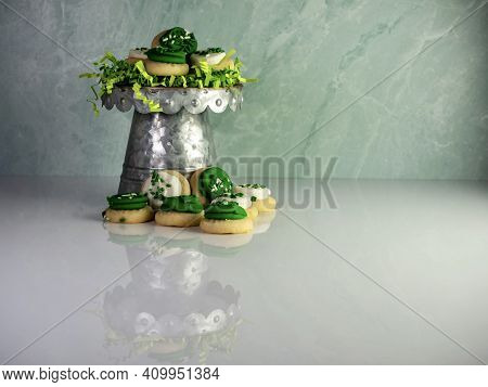 St Patrick's Day Holiday Frosted Sugar Cookies With Green And White Frosting And Sprinkles With Four