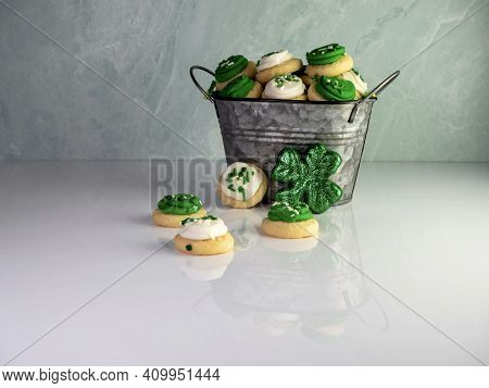 St Patrick's Day Holiday Frosted Sugar Cookies With Green And White Frosting And Sprinkles With Four