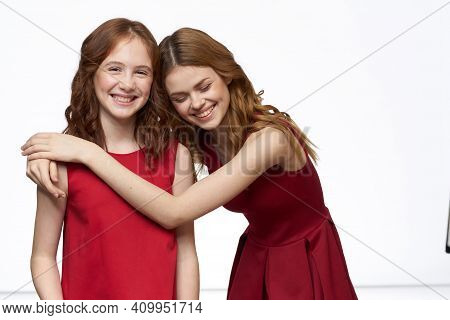 Mom And Daughter Red Dress Hug Family Joy Friendship