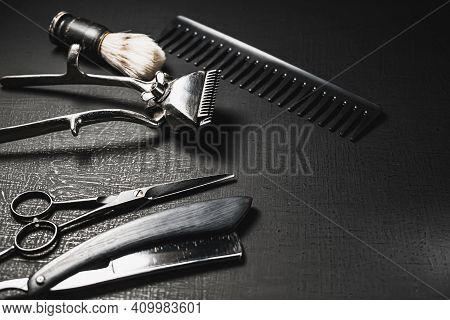 Vintage Barber Tools. Dangerous Razor, Hairdressing Scissors, Old Manual Clipper, Combs, Shaving Bru
