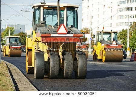 Pneumatic tyred roller compactor at asphalt pavement works for road repairing
