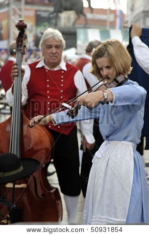 ZAGREB,CROATIA - JULY 19: Members of folk groups Santa Gorizia from Italy during the 47th International Folklore Festival in center of Zagreb,Croatia on July 19,2013