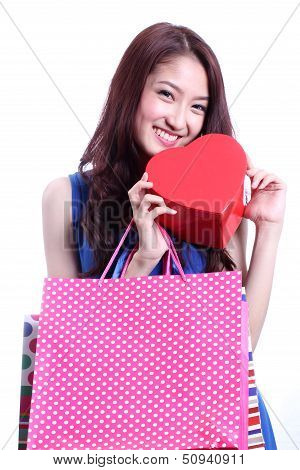 Closed up Asian woman carrying a chocolate box