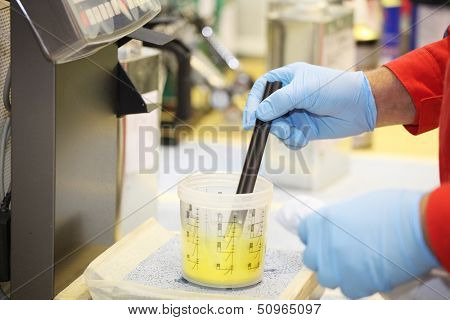 Preparation of paint for car painting in car body shop laboratory
