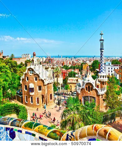 BARCELONA, SPAIN - JULY 19: Ceramic mosaic Park Guell on July 19, 2013 in Barcelona, Spain. Park Guell is the famous architectural town art designed by Antoni Gaudi and built in the years 1900 to 1914