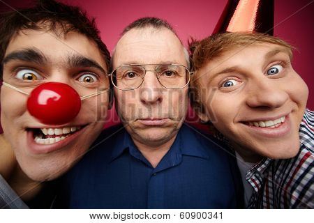 Three april fools looking at camera with different expressions