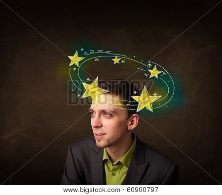 Young man with yellow stars circleing around his head illustration 