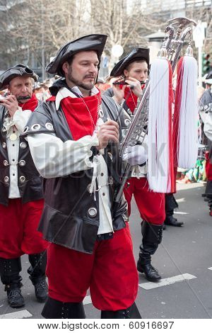 Focused Musicians Walking At A Carnival Parade