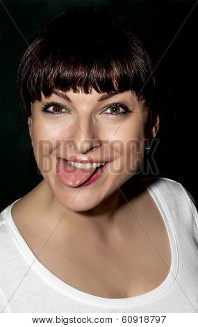 Playful Young Brunette Making A Funny Face