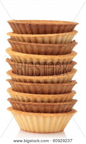 Stack Of Empty Tartlets On White