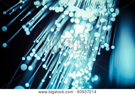 Fiber optic cables, fibre connection, telecomunications concept.