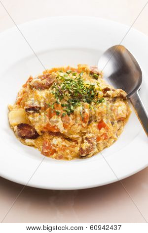 meal called leco (mixture of vegetables and eggs with sausage)