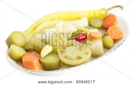Preserved vegetables on a white background    