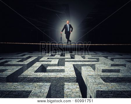 smiling man on rope with 3d maze background