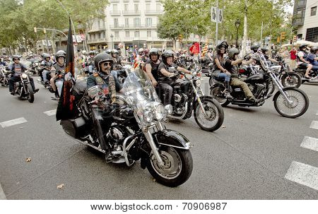 BARCELONA - JULY, 6: Harley-Davidson Motorcycles driving during the Barcelona Harley Days event on the city streets, July 6, 2014 in Barcelona, Spain