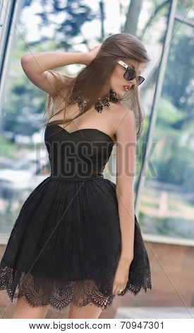 Beautiful girl model in summer outside .