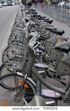PARIS, FRANCE - NOVEMBER 07, 2012: Velib bucycles in the row on January 6, 2012 in Paris, France. Velib is a large-scale public bicycle sharing system in Paris, France.