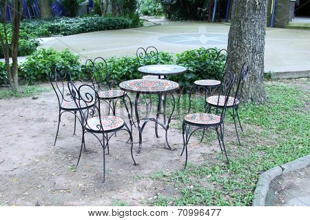 metal garden chair in beautiful garden